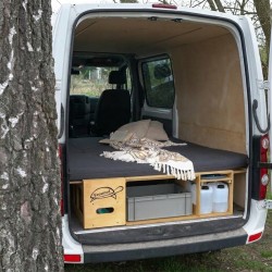 Sleeping feature in Vacamod VanBus camping module with unfolded mattress