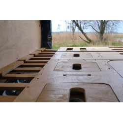 VanBus camping box perfectly fitted to the side walls of the van interior