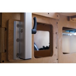 Dedicated holder for securing the folding table leg inside the box