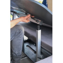 Removing the swivel table top from the folding, adjustable table leg